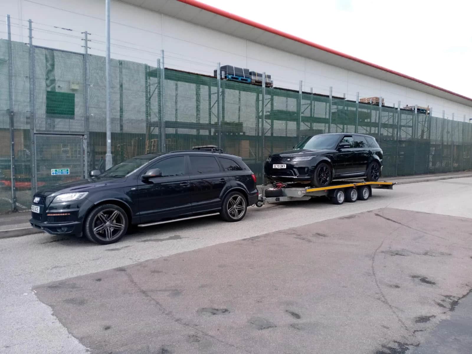 KYS Recovery transporting a Range Rover on a trailer