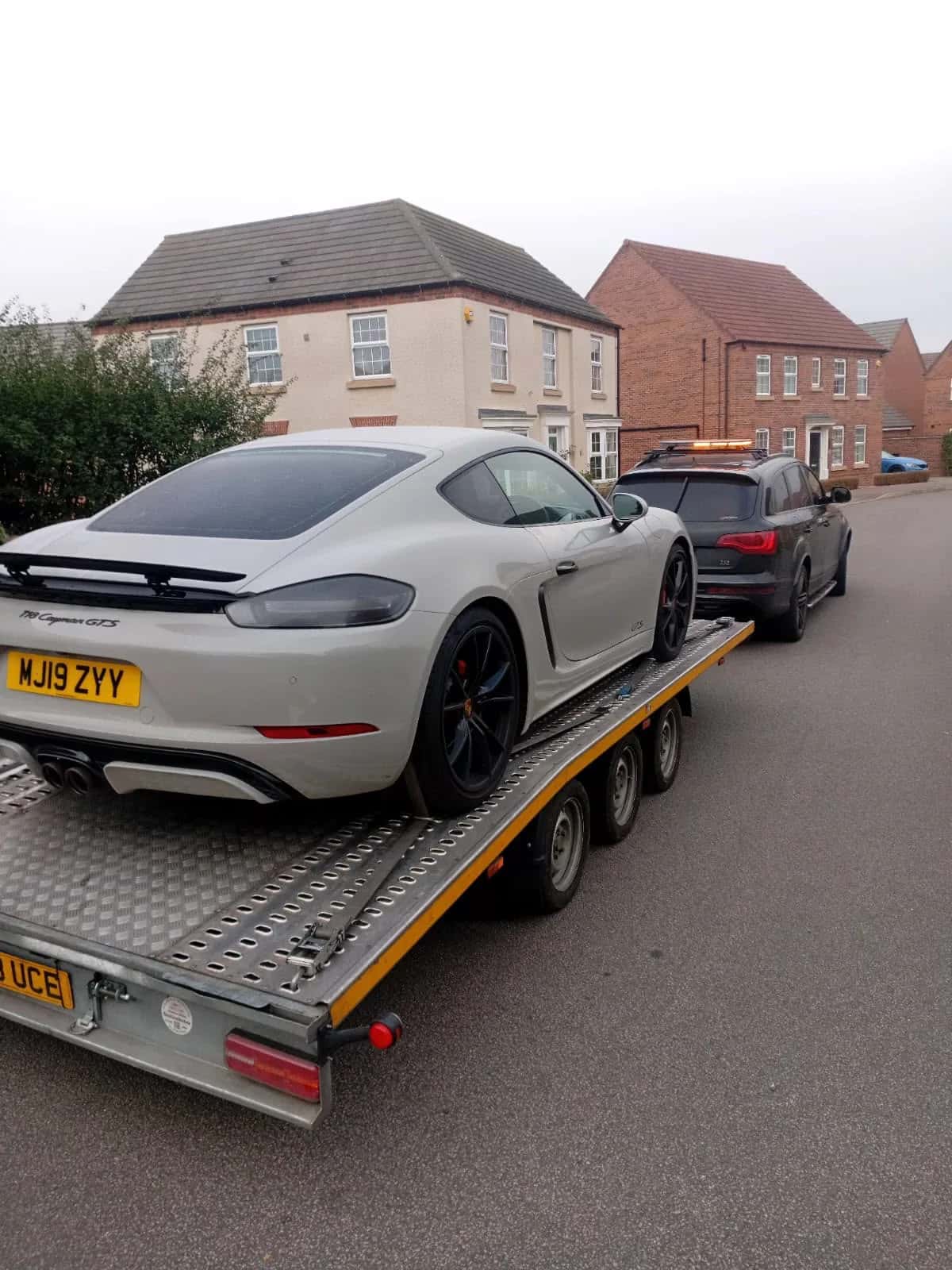 Porsche being transported by KYS Recovery
